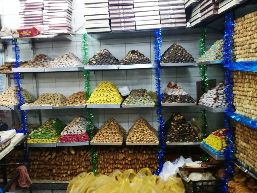 أهالي ومحلات الأقصر تنطلق في صناعة كحك وبسكويت العيد (3)