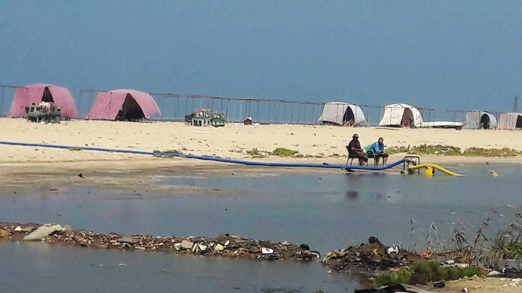 أضبط مخالفة  كارثة  مياه المجارى تصب فى شاطئ بورفؤاد ...  (7)