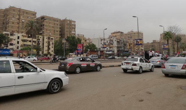 مسيرة بالسيارات تجوب شوارع جامعة الدول العربية لحث المصريين على التصويت