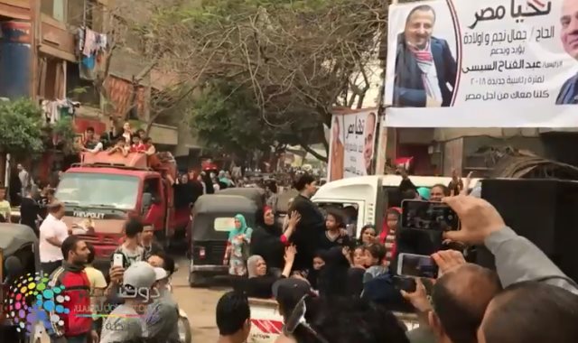 مسيرة تجوب شوارع امبابة لدعوة المواطنيين للمشاركة بالانتخابات 