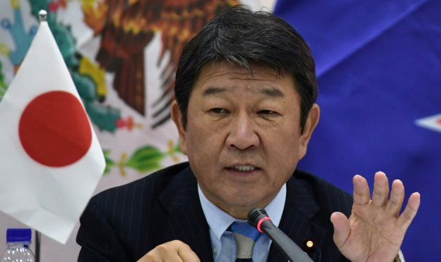 وزير الاقتصاد اليابانى توشيميتسو موتيجى