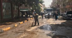 حملة نظافة حول اللجان الانتخابية فى شوارع امبابة