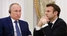 الرئيس الروسي بوتين ونظيره الفرنسي ماكرون